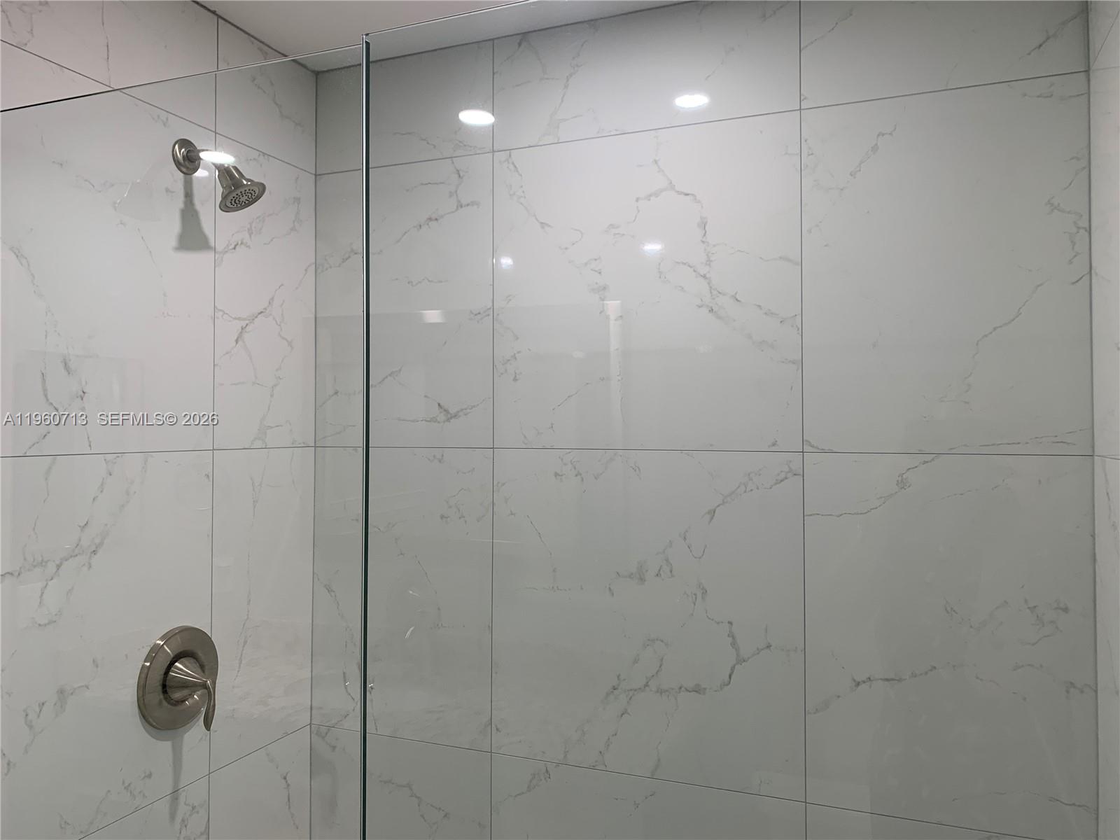 6102 Southeast Landing Way, Unit 14 Stuart, FL 34997 - Photo 24 of 45 Guest Shower