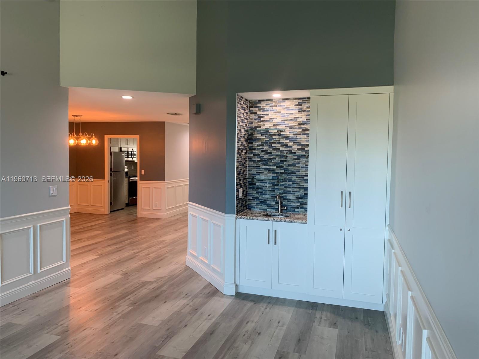 6102 Southeast Landing Way, Unit 14 Stuart, FL 34997 - Photo 25 of 45 Custom Wet Bar with Storage