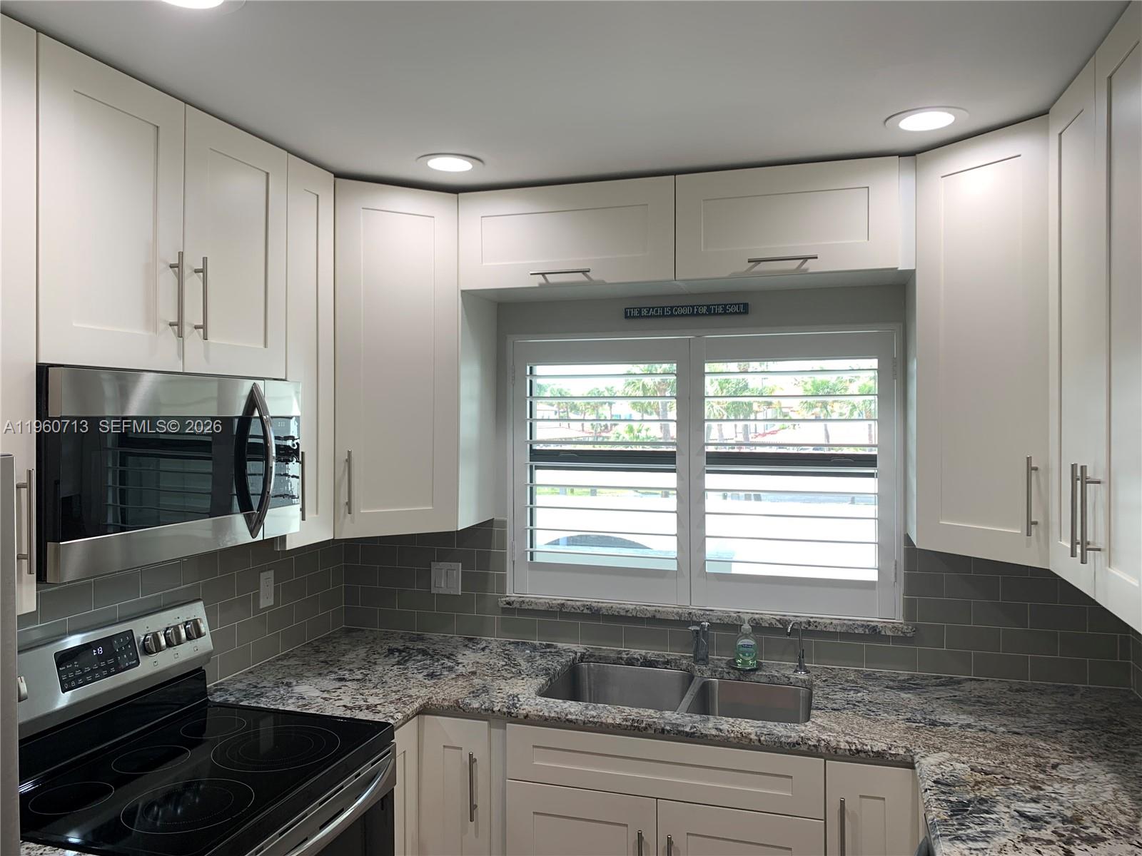 6102 Southeast Landing Way, Unit 14 Stuart, FL 34997 - Photo 6 of 45 Remodeled Kitchen