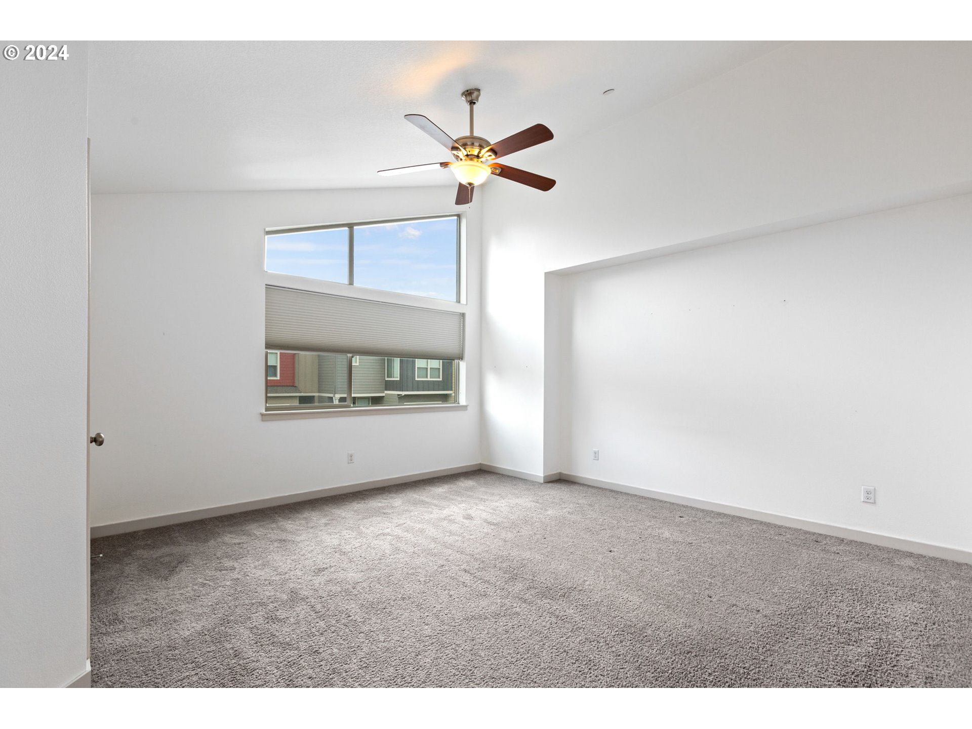 117 North 44th Place Ridgefield, WA 98642 - Photo 21 of 30 a view of room with a ceiling fan and chandelier fan