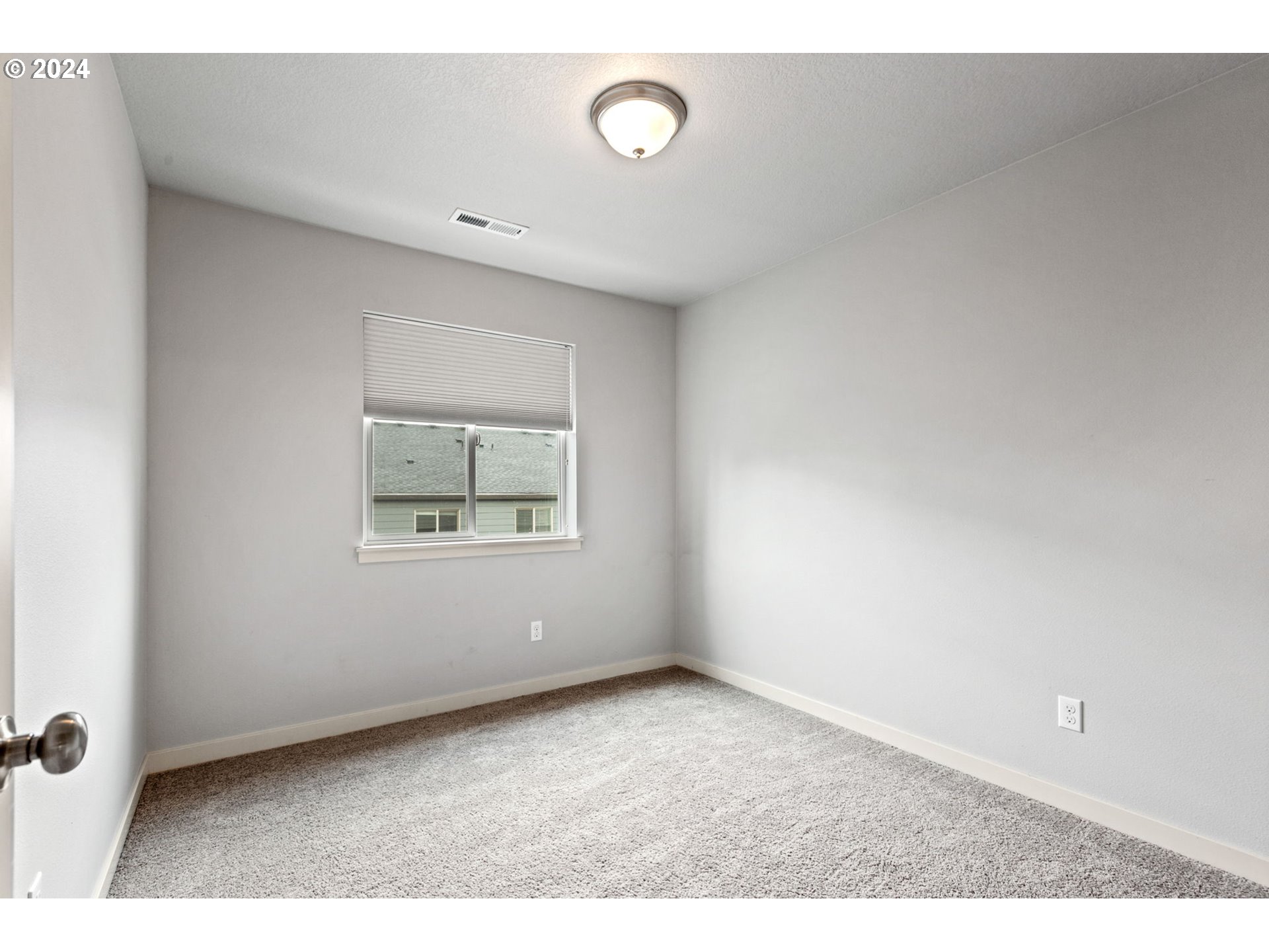 117 North 44th Place Ridgefield, WA 98642 - Photo 26 of 30 a view of an empty room with a window