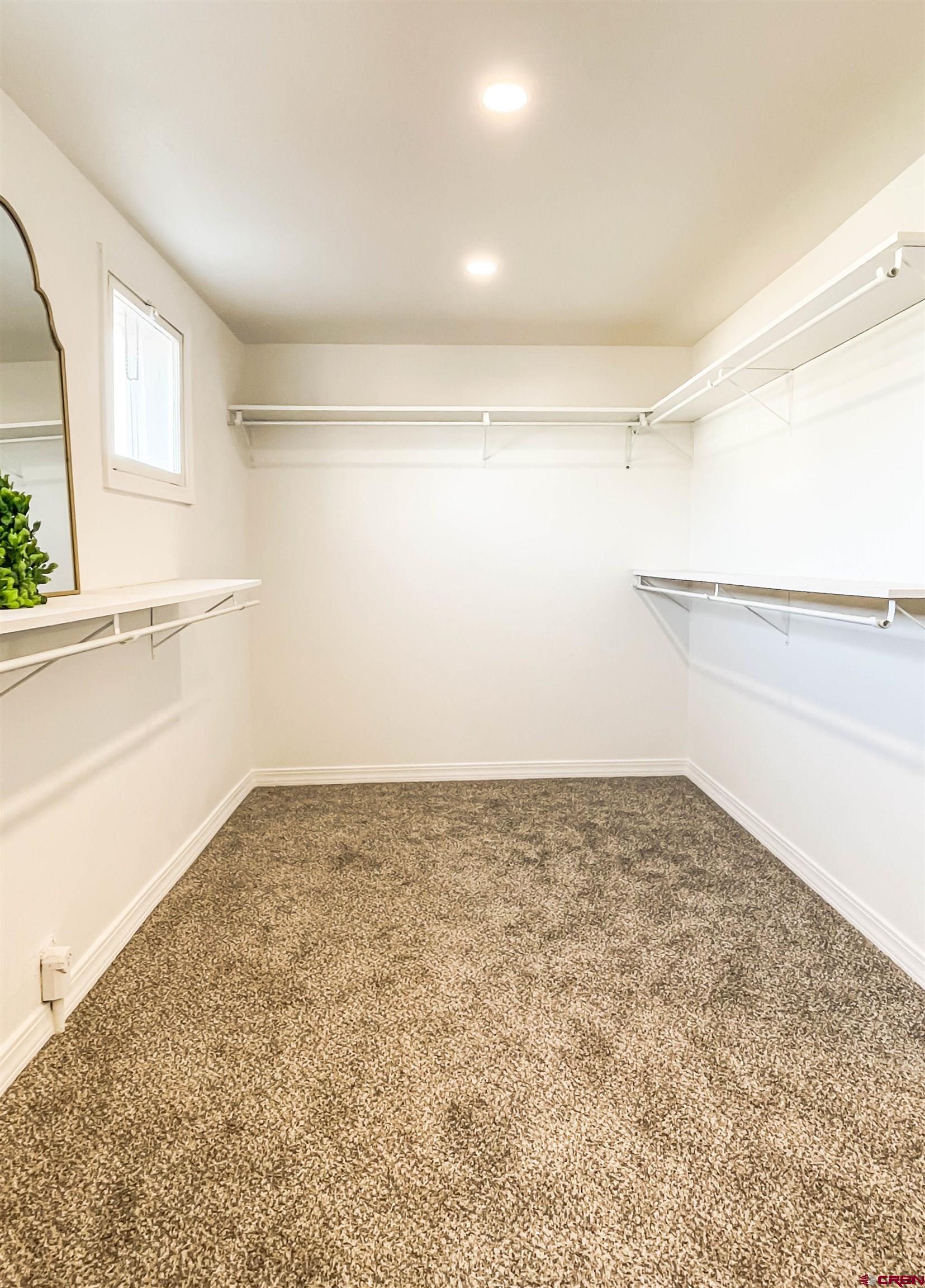 4956 1550 Road Delta, CO 81416 - Photo 23 of 35 a view of a room with an empty space and window