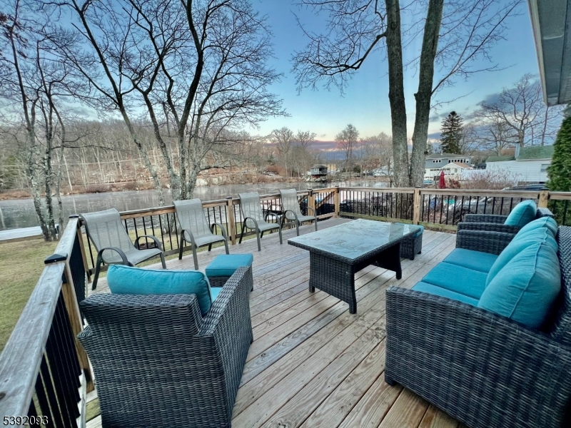 2 Hilltop Road Hopatcong, NJ 07821 - Photo 14 of 15 a balcony with furniture and a table