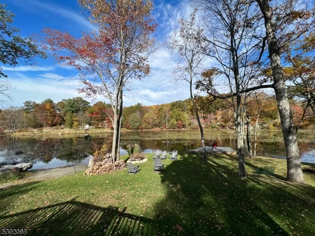 a view of lake with green space