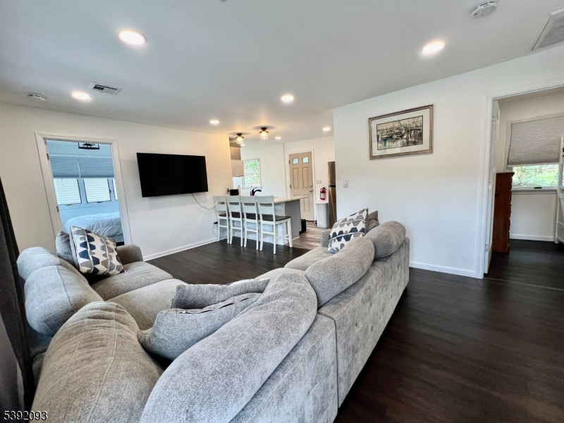 2 Hilltop Road Hopatcong, NJ 07821 - Photo 5 of 15 a living room with furniture and a flat screen tv