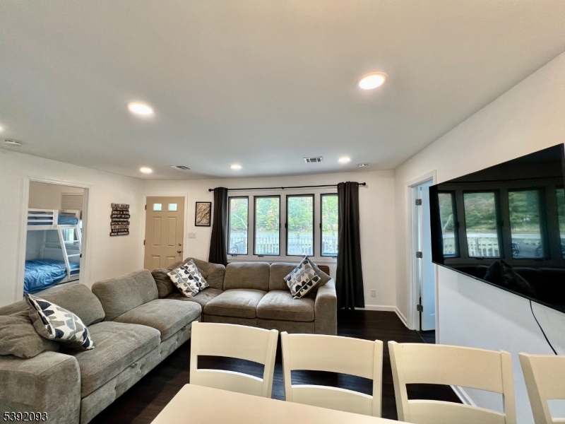 2 Hilltop Road Hopatcong, NJ 07821 - Photo 9 of 15 a living room with furniture and a large window