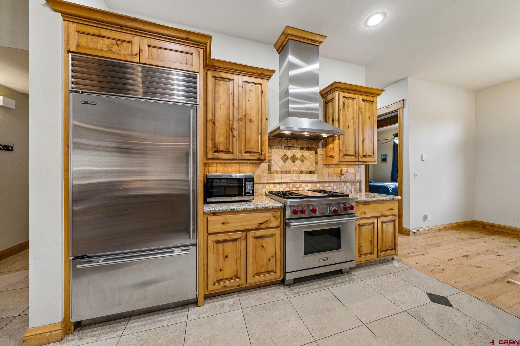 70 Clear Creek Loop Durango, CO 81301 - Photo 9 of 35 a kitchen with a stove and a refrigerator