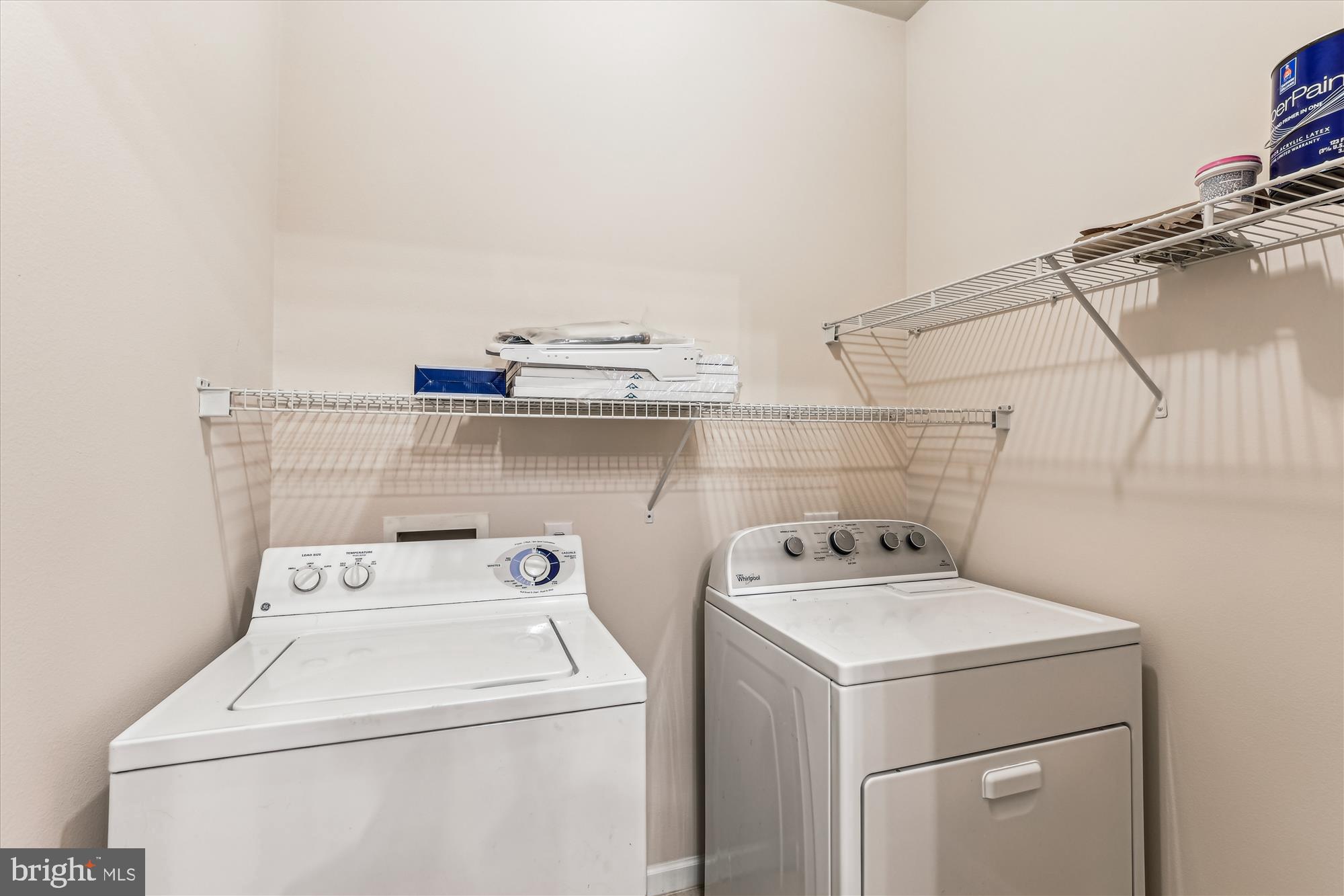 12941 Centre Park Circle, Unit 216 Herndon, VA 20171 - Photo 16 of 44 a utility room with dryer and washer