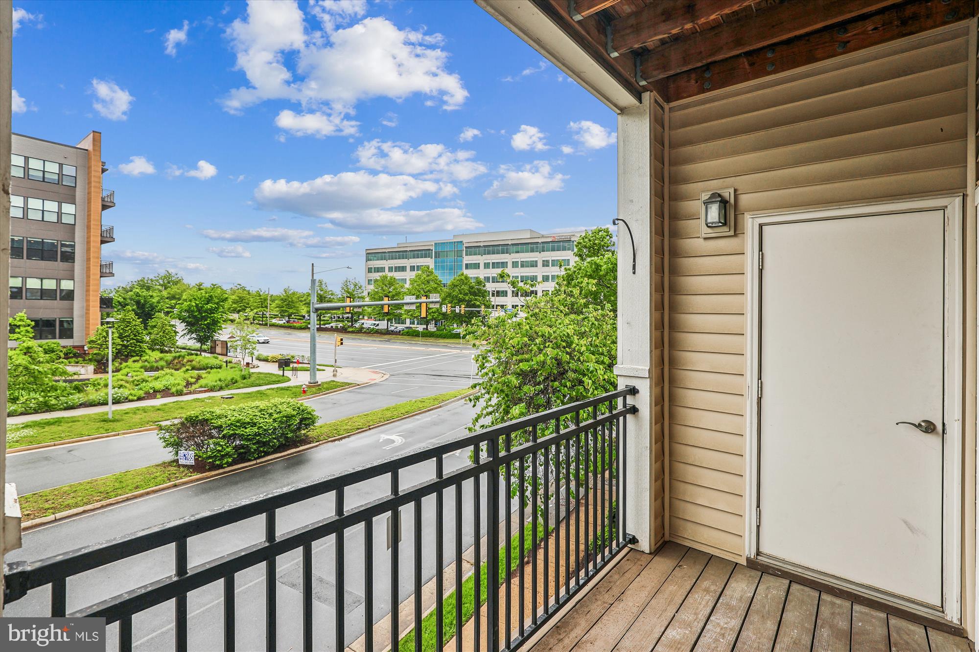 12941 Centre Park Circle, Unit 216 Herndon, VA 20171 - Photo 27 of 44 a view of a porch with a yard