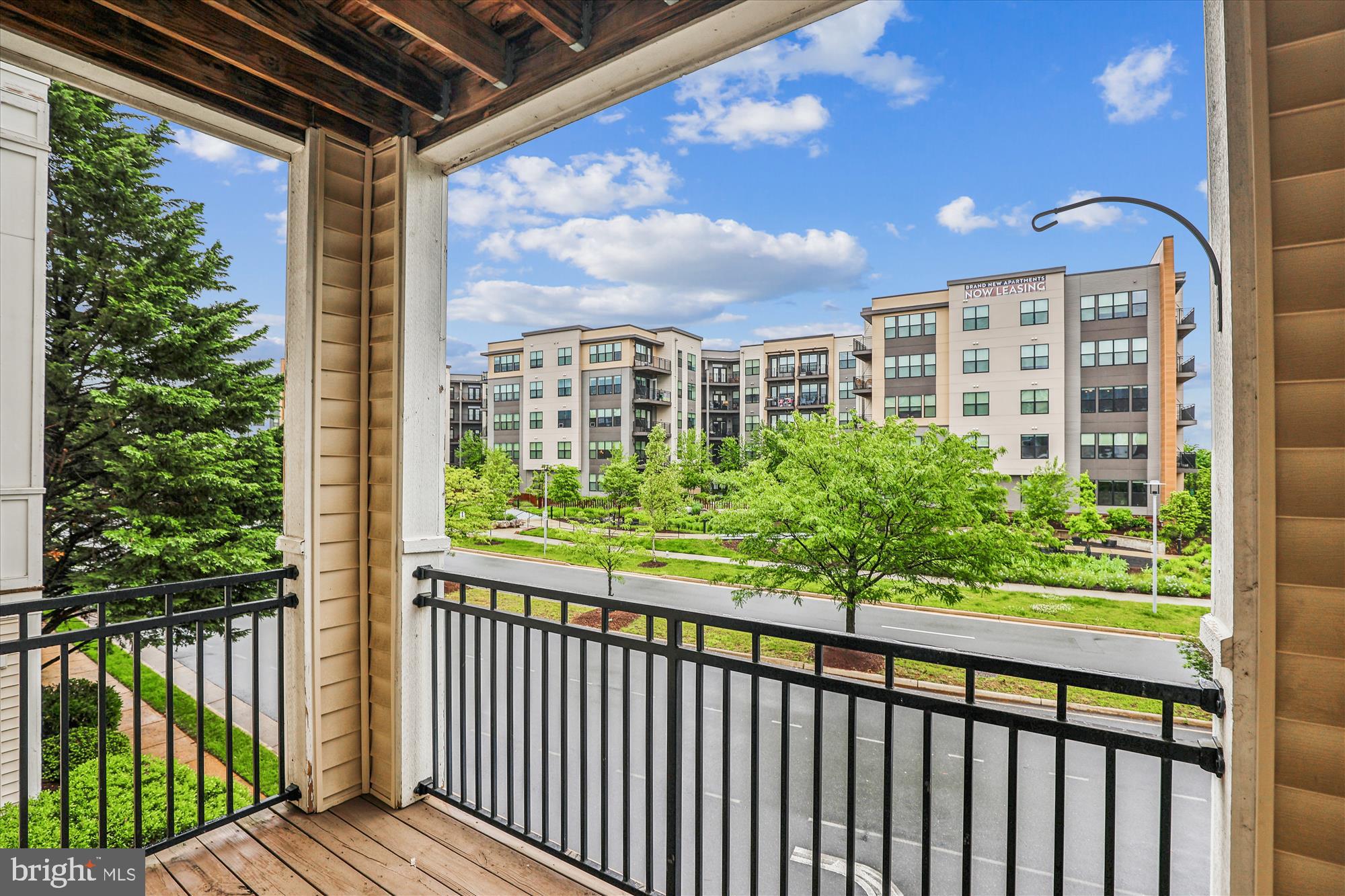 12941 Centre Park Circle, Unit 216 Herndon, VA 20171 - Photo 28 of 44 a view of a balcony with wooden floor