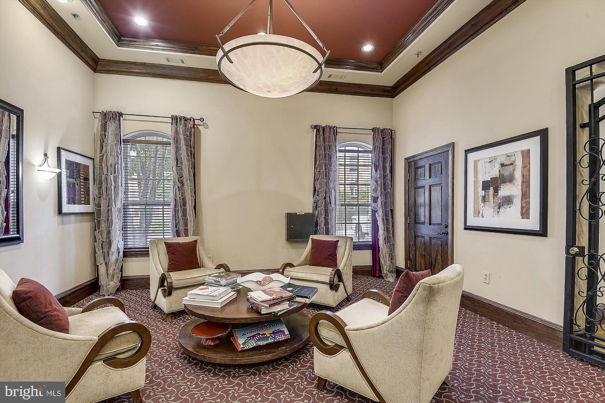 12941 Centre Park Circle, Unit 216 Herndon, VA 20171 - Photo 40 of 44 a living room with furniture and window