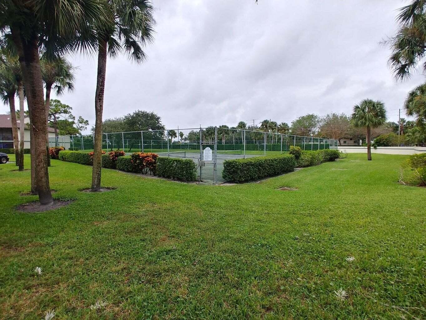 6258 Chasewood Drive, Unit E Jupiter, FL 33458 - Photo 3 of 15 a view of a park