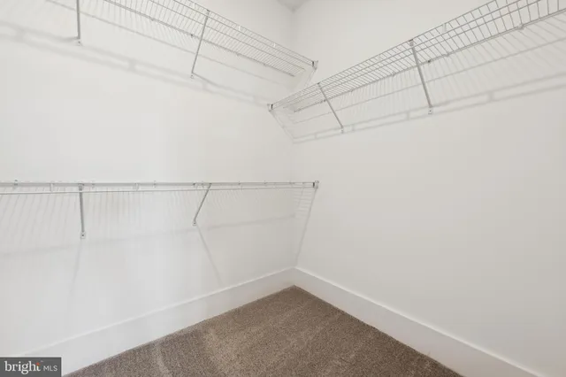 a bathroom with a granite countertop sink a toilet and a bathtub