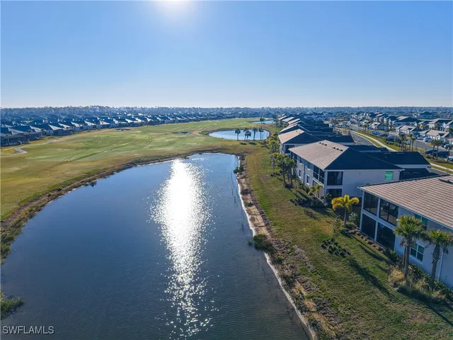 a view of a lake with a city