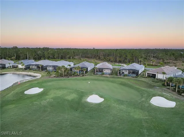 a view of a garden with houses