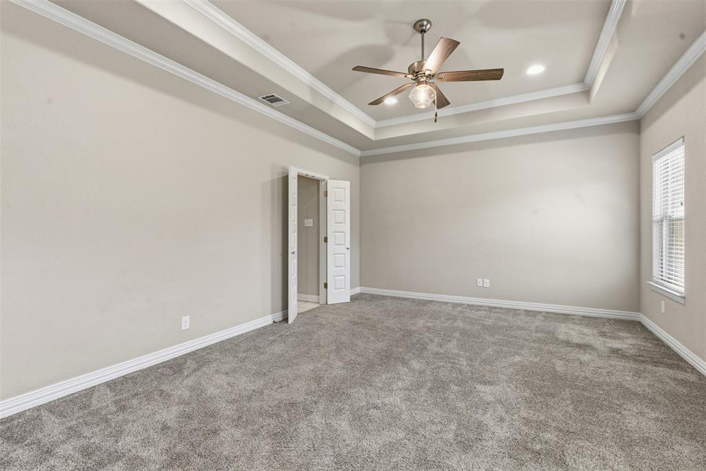 906 Chestnut Grove Drive Cleburne, TX 76033 - Photo 16 of 29 a view of an empty room with a window