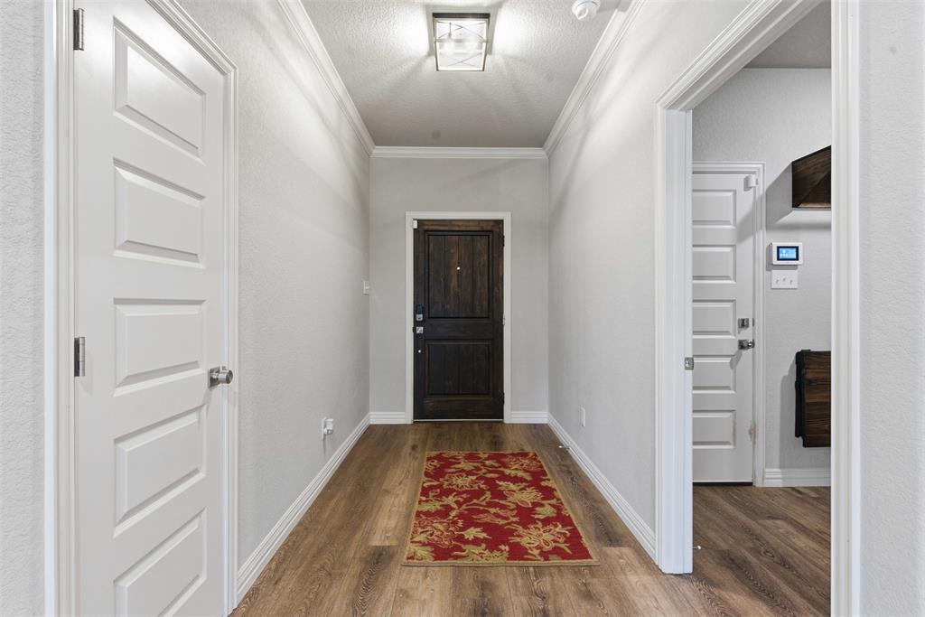 906 Chestnut Grove Drive Cleburne, TX 76033 - Photo 20 of 29 a view of hallway with wooden floor