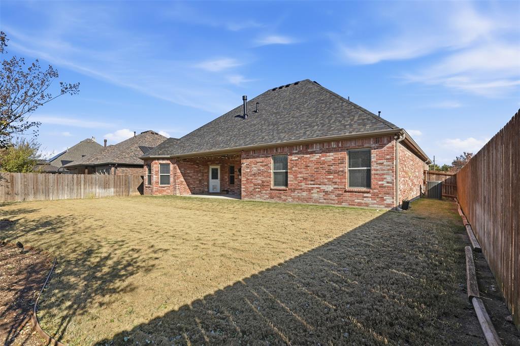906 Chestnut Grove Drive Cleburne, TX 76033 - Photo 29 of 29 a front view of a house with yard