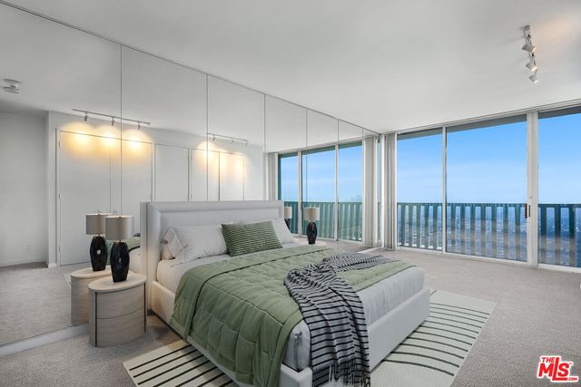 a view of an empty room with a chandelier