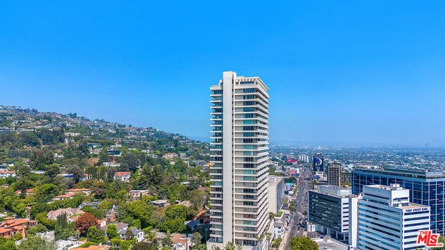 a view of a city with tall buildings