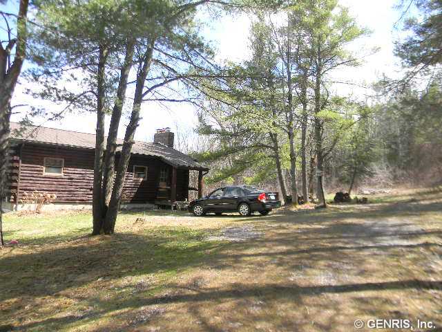 5991 Ketchum Road Canandaigua Town, NY 14424 - Photo 1 of 1 Exterior Front. REAL LOG HOME 1300 sf. 3 bedroom