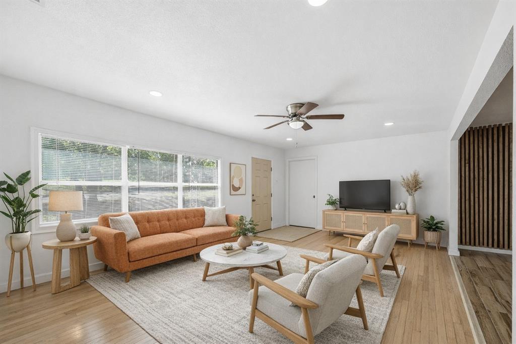 4310 Utah Avenue Dallas, TX 75216 - Photo 1 of 1 a living room with furniture and a flat screen tv