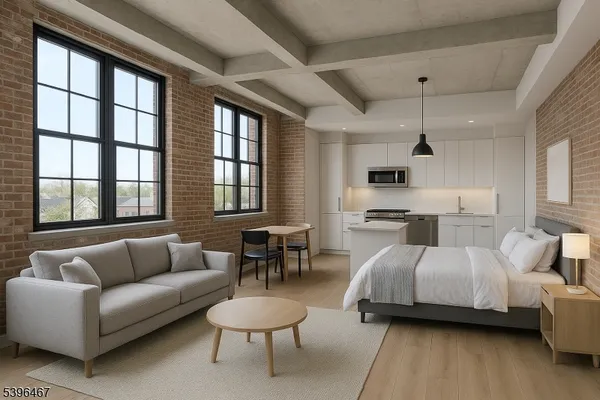 a spacious bedroom with a bed and a couch