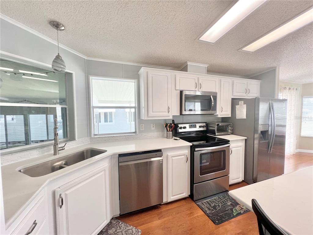 1100 South Belcher Road, Unit 512 Largo, FL 33771 - Photo 12 of 73 Kitchen with stainless steel appliances