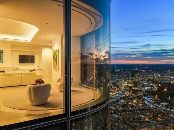 a view of a living room and bathroom