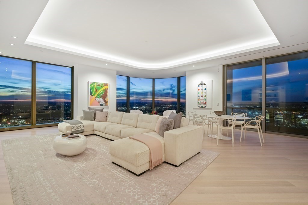 1 Dalton Street, Unit 5801/5802 Boston, MA 02115 - Photo 11 of 28 a living room with furniture and a large window