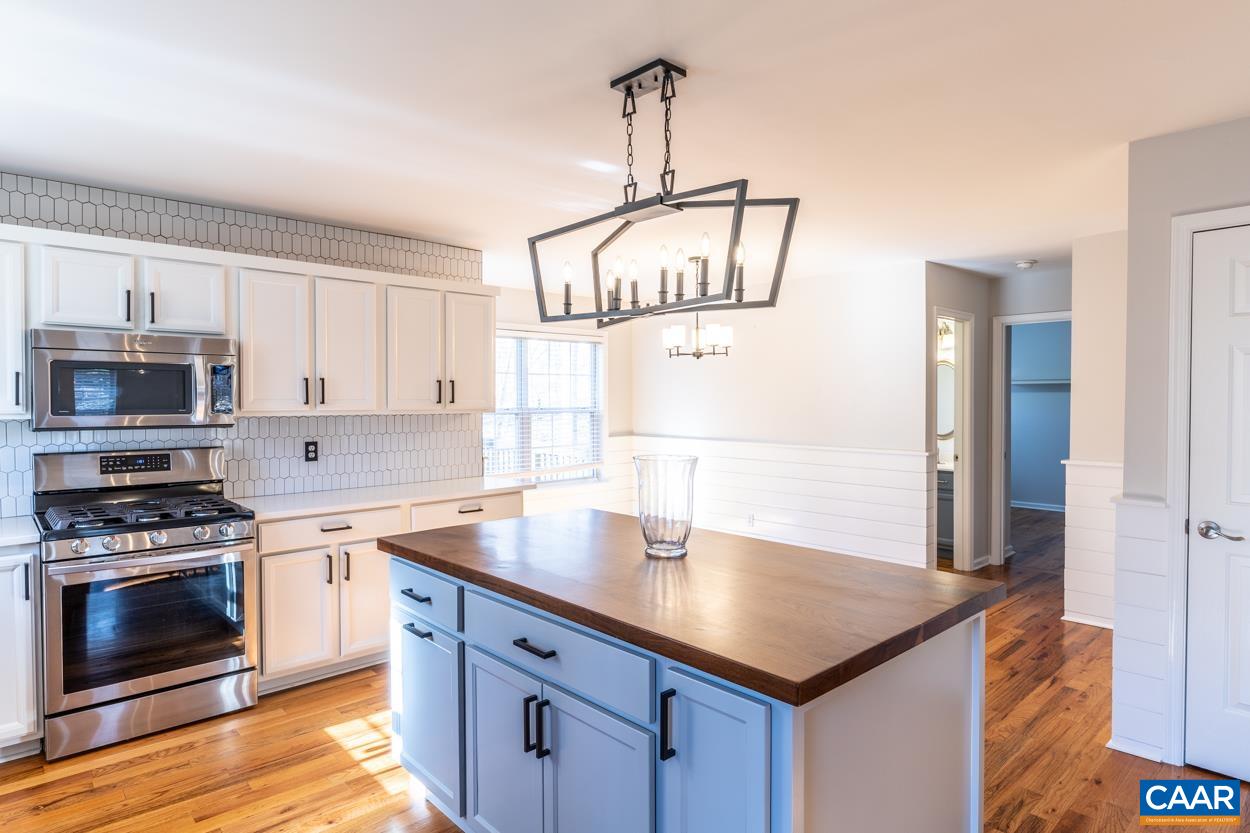 35 Zephyr Road Palmyra, VA 22963 - Photo 11 of 51 a kitchen with stainless steel appliances granite countertop a sink a stove and a refrigerator