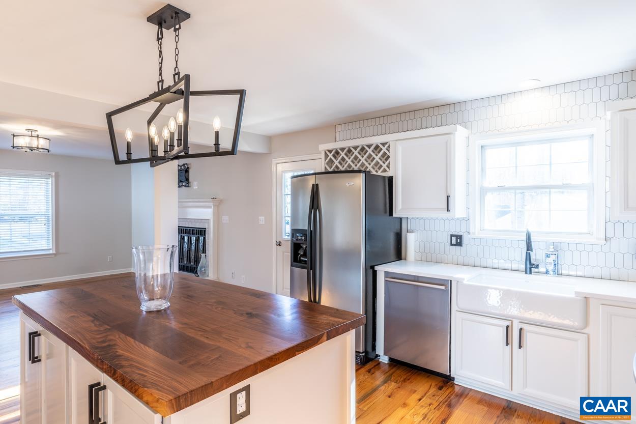 35 Zephyr Road Palmyra, VA 22963 - Photo 13 of 51 a kitchen with stainless steel appliances granite countertop a sink a refrigerator and a granite counter tops