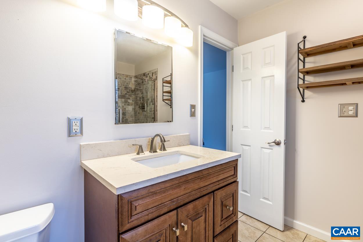 35 Zephyr Road Palmyra, VA 22963 - Photo 30 of 51 a bathroom with a sink and a mirror