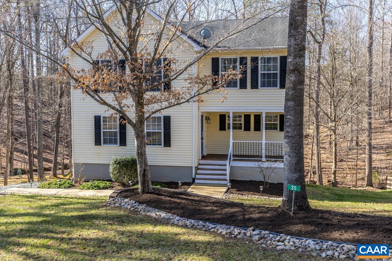 35 Zephyr Road Palmyra, VA 22963 - Photo 3 of 51 a front view of a house with a yard