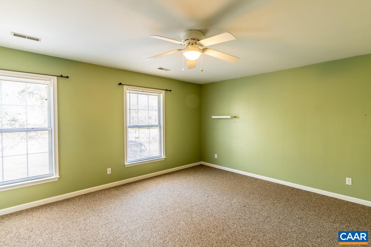 35 Zephyr Road Palmyra, VA 22963 - Photo 37 of 51 an empty room with windows and fan