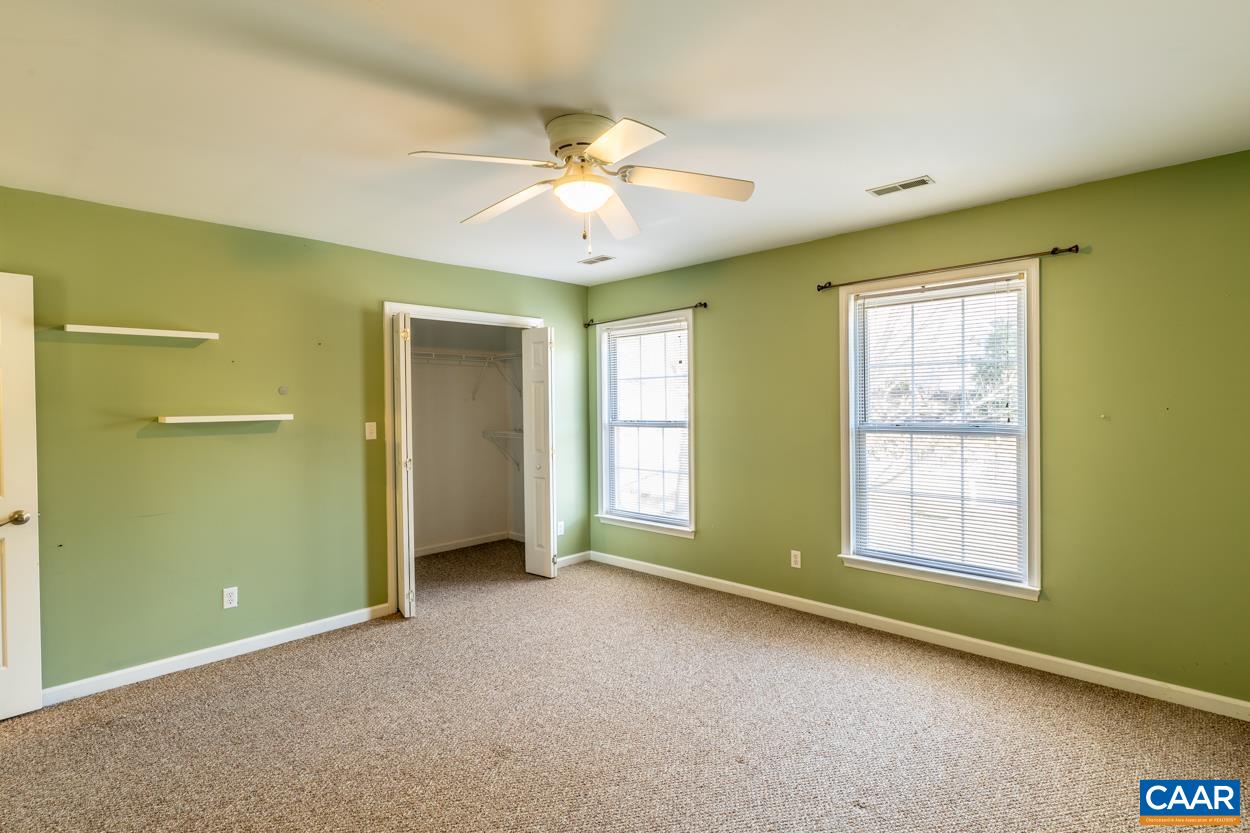 35 Zephyr Road Palmyra, VA 22963 - Photo 38 of 51 a view of an empty room with window and chandelier fan