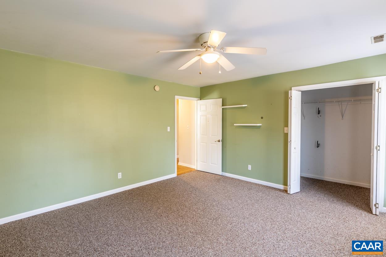 35 Zephyr Road Palmyra, VA 22963 - Photo 39 of 51 an empty room with a fan and a fan