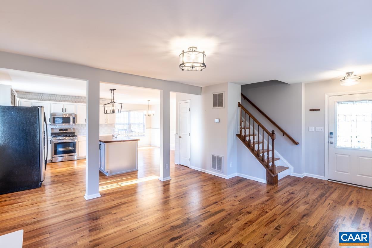 35 Zephyr Road Palmyra, VA 22963 - Photo 7 of 51 a view of entryway and hall with wooden floor