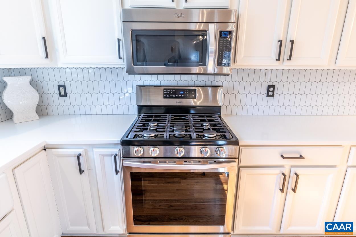 35 Zephyr Road Palmyra, VA 22963 - Photo 9 of 51 a stove top oven sitting inside of a kitchen
