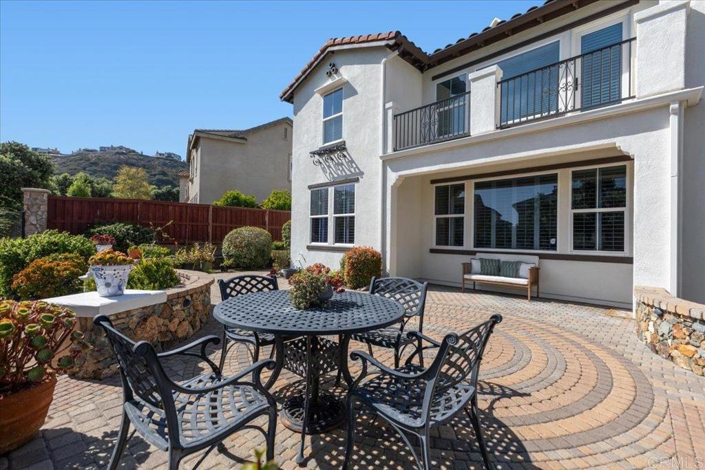 838 Luminara Way San Marcos, CA 92078 - Photo 48 of 54 a view of a house with backyard and sitting area