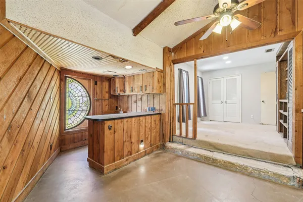 a view of an entryway with a chandelier