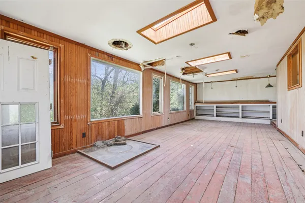 a view of livingroom with hardwood floor and window