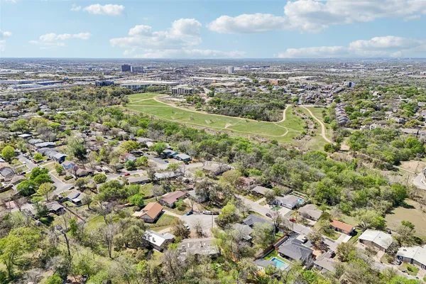 an aerial view of residential building with parking space