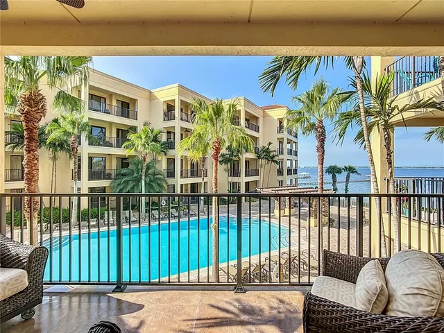 a view of a balcony with a potted plant