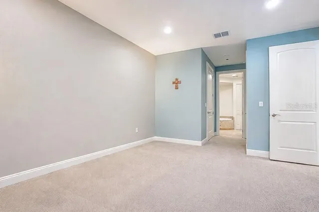 a bathroom with a bathtub and a sink