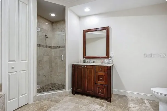 a view of a swimming pool with outdoor seating