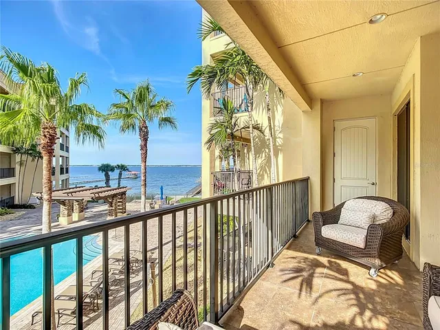 a view of balcony with furniture