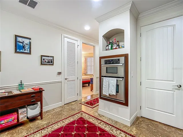a kitchen with a sink and a refrigerator