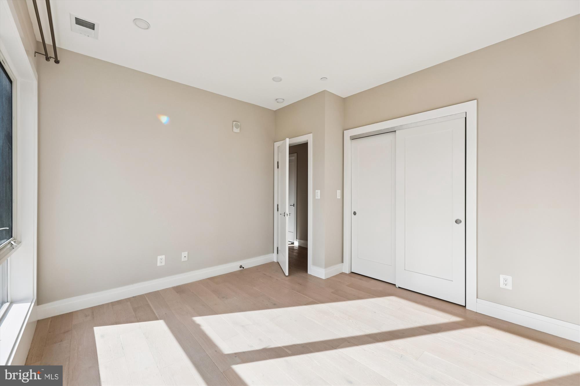 1102 Staples Street Northeast, Unit 301 Washington, DC 20002 - Photo 12 of 24 a view of an empty room