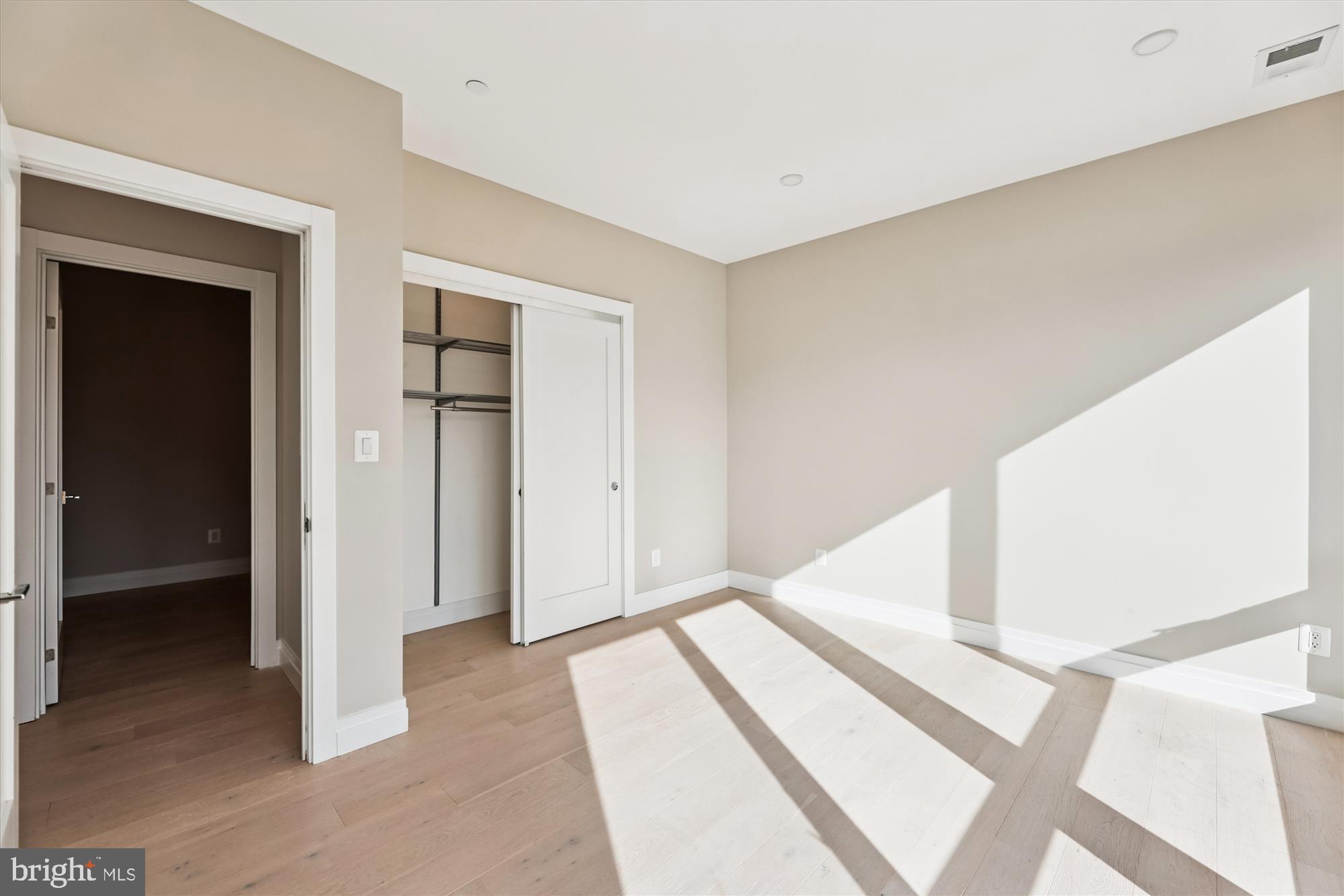 1102 Staples Street Northeast, Unit 301 Washington, DC 20002 - Photo 13 of 24 a view of staircase with white walls